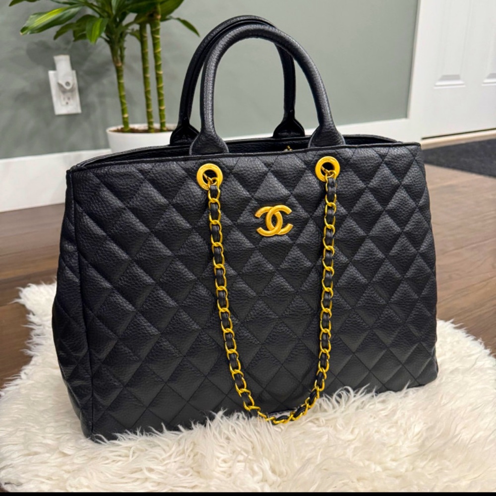 CHANEL Black Quilted Leather Tote with Gold Chain and CC Emblem